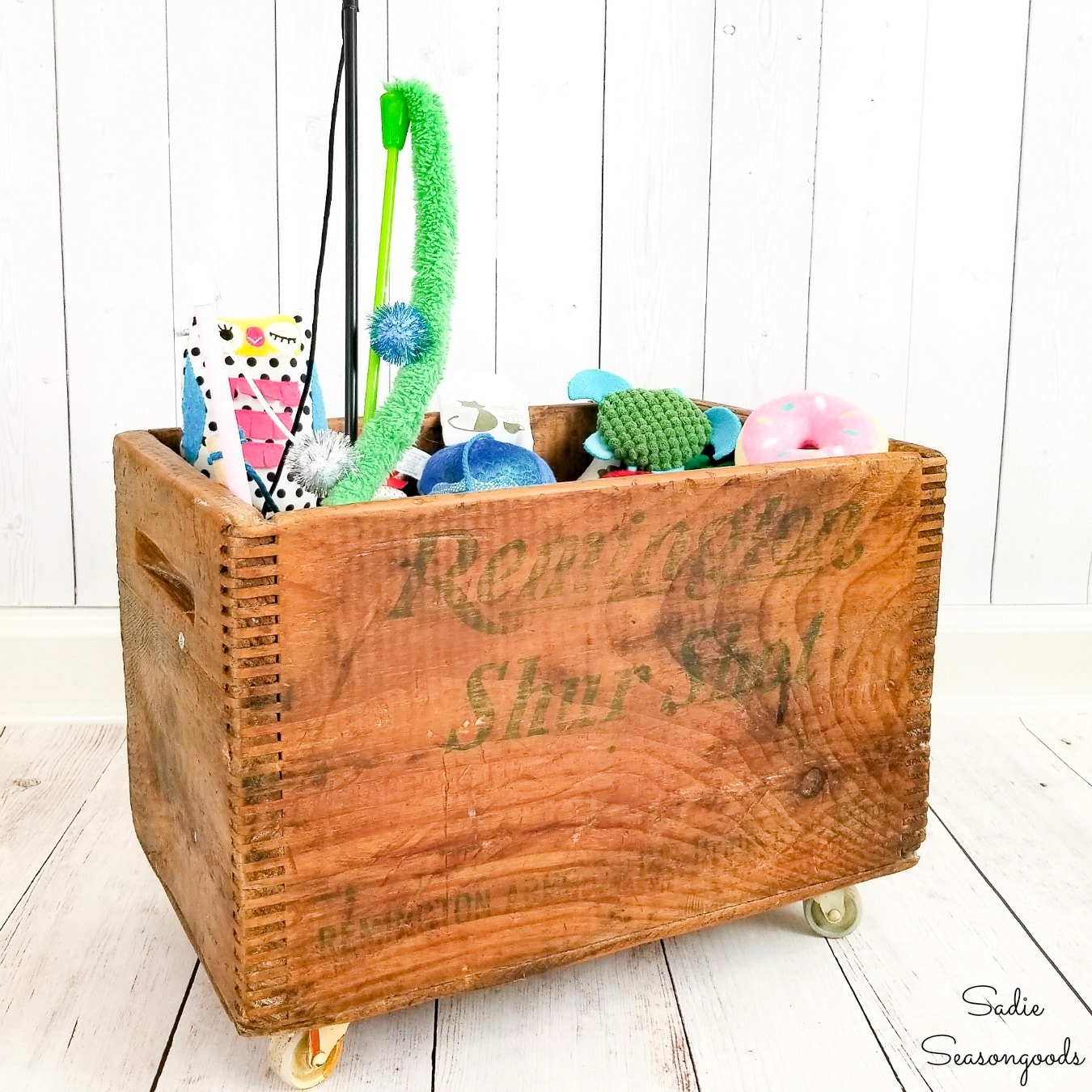 Cat Toy Storage in a Vintage Wooden Crate on Vintage Casters
