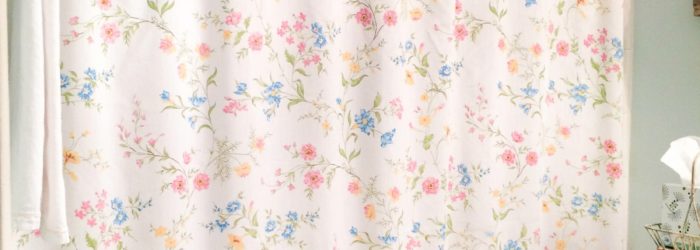 Floral shower curtain for a cottage style bathroom from vintage bed sheets