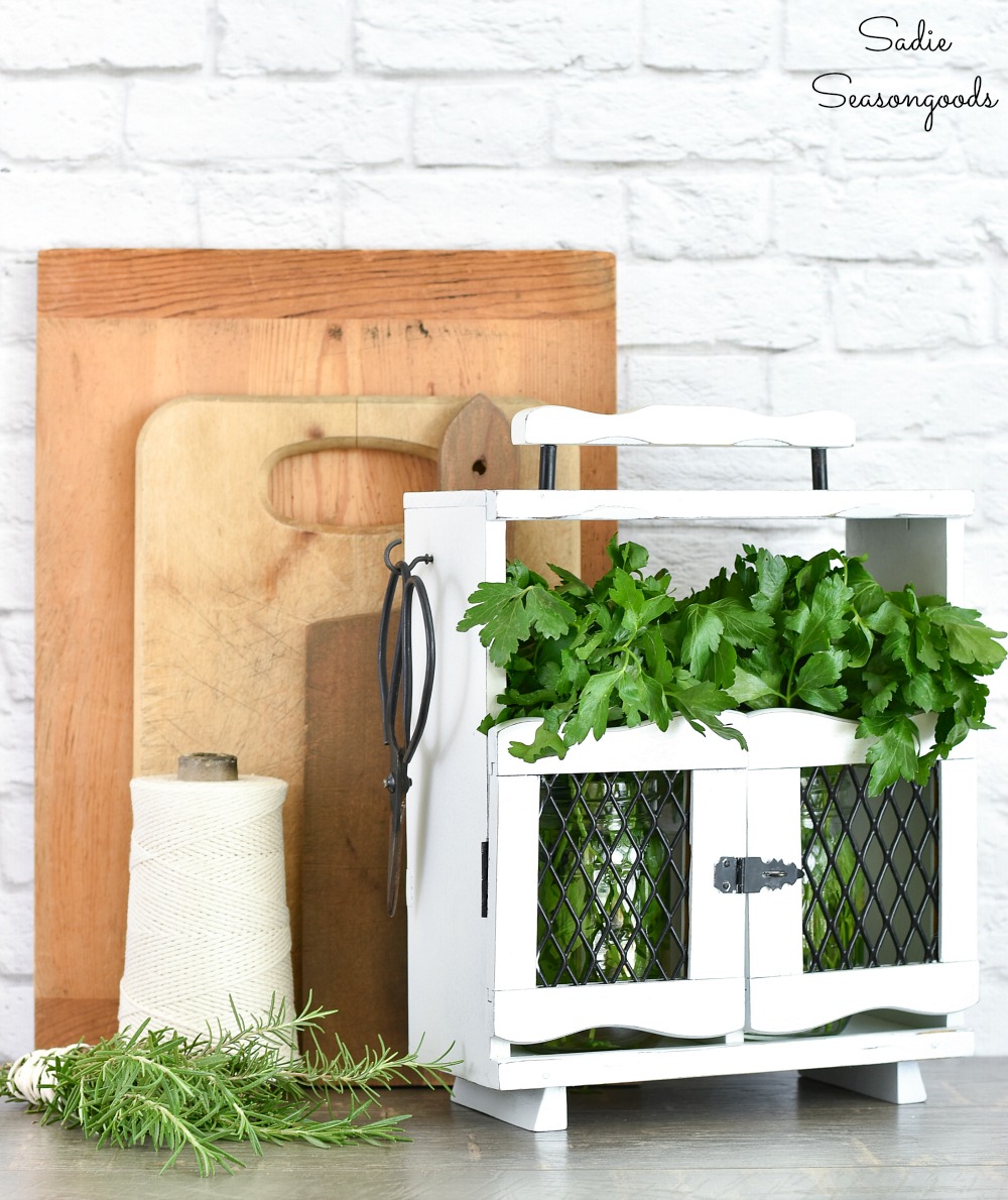 Herb holder by repurposing a decanter tantalus or wooden caddy