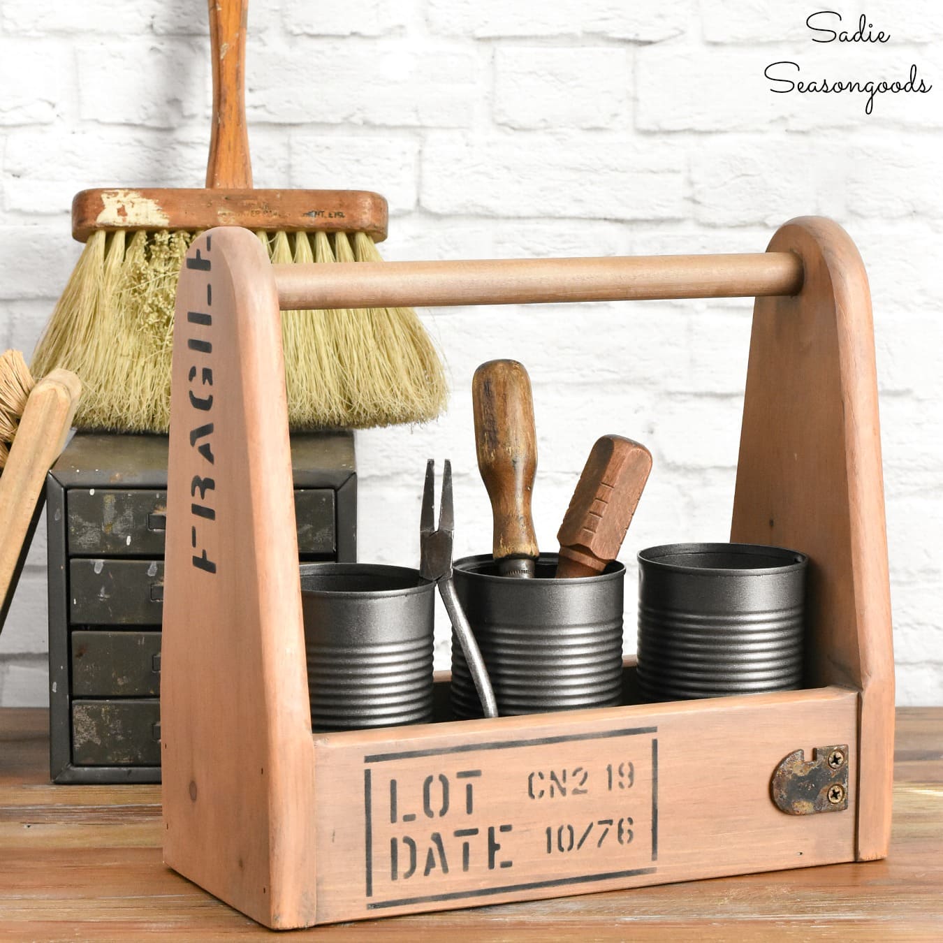 Industrial Style Decor with a Wooden Tool Caddy and Tin Cans