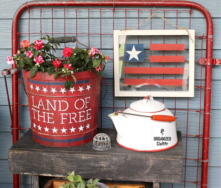 stenciled bucket planter for 4th of july decorations
