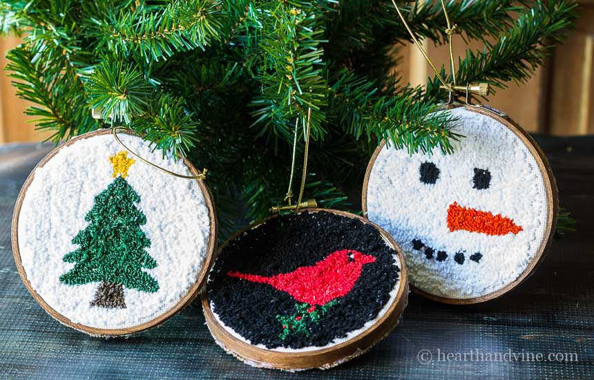 punch needle ornaments in embroidery hoops