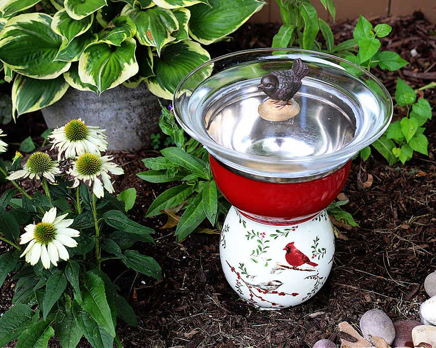 totem style bird bath from thrift store dishes