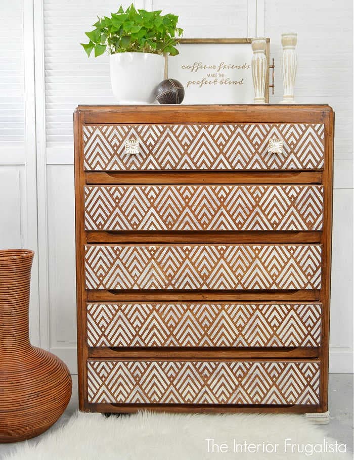 stenciling the drawer fronts on a dresser