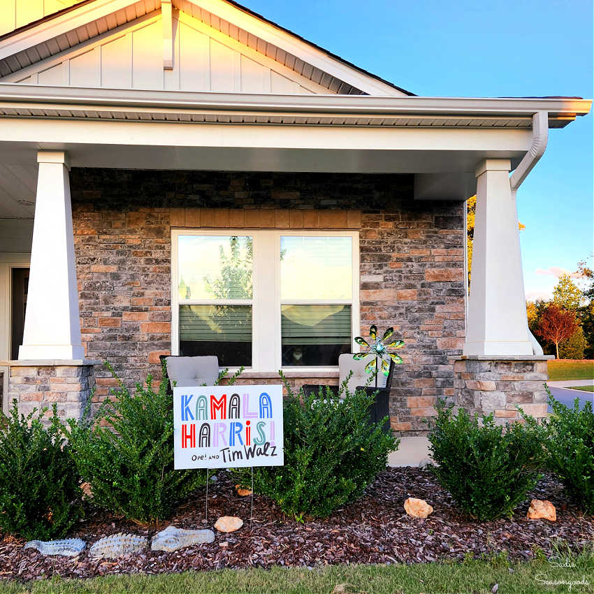 harris walz sign in the front yard