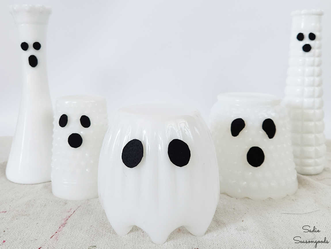 halloween ghosts with milk glass vases