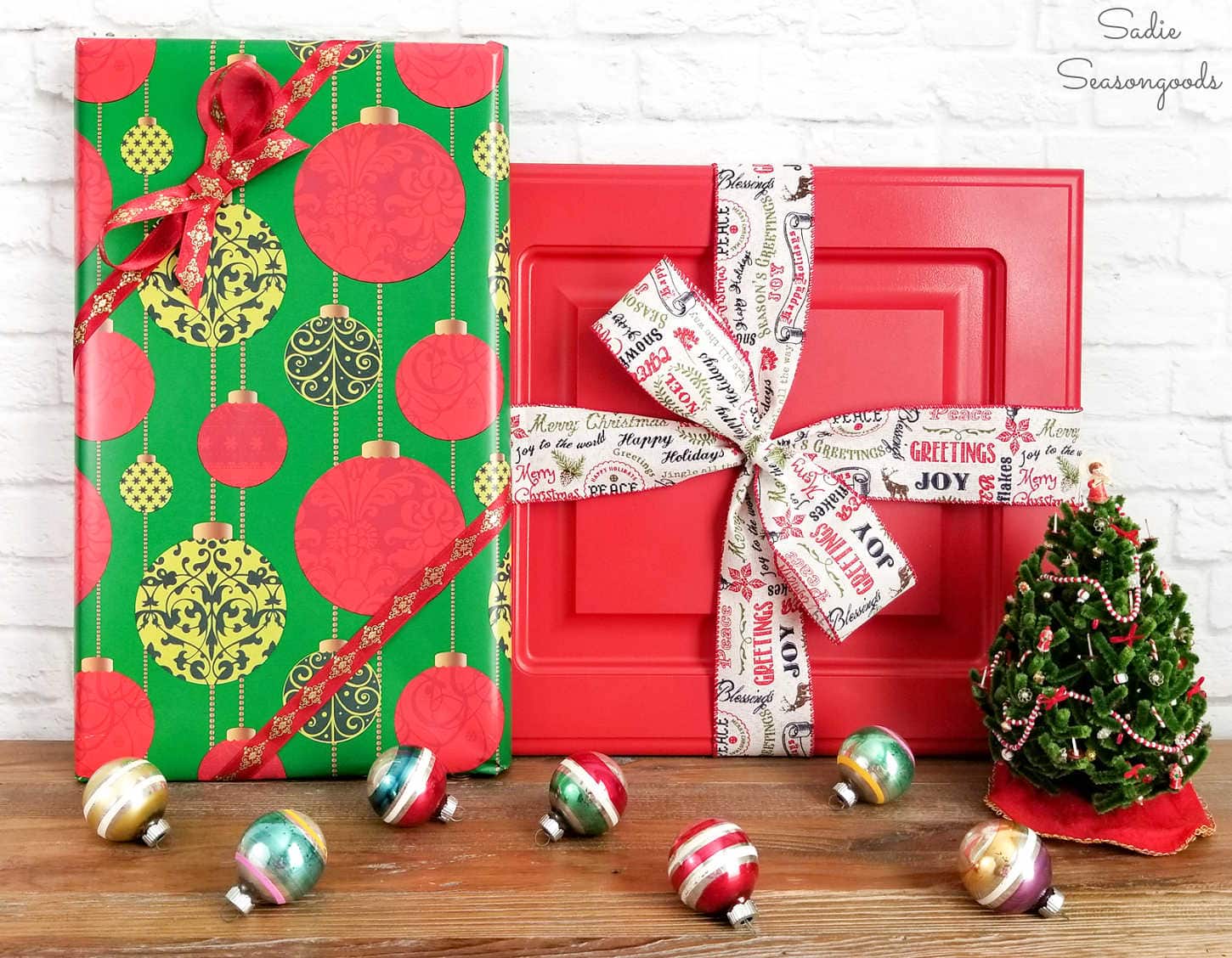 decorating a christmas mantel with gifts