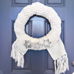 winter wreath with knitted scarves