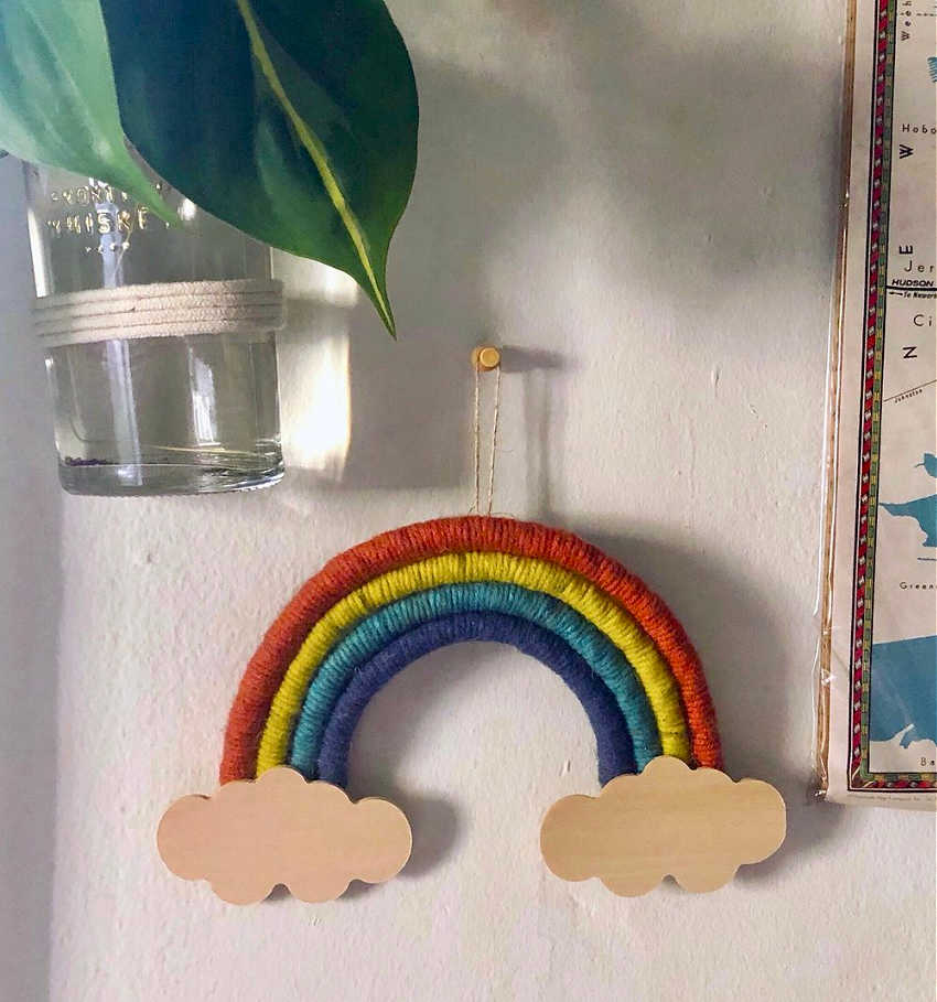 rainbow wall art with yarn