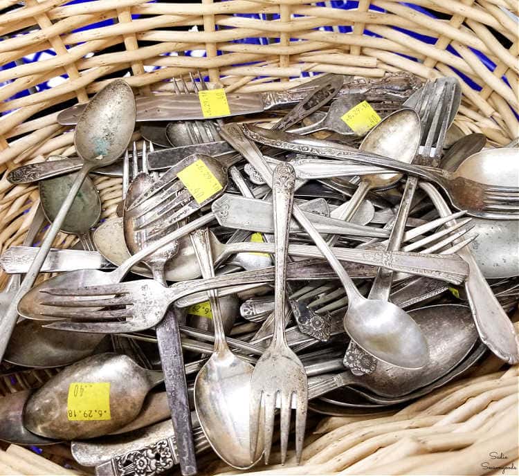 vintage silverware at a thrift store